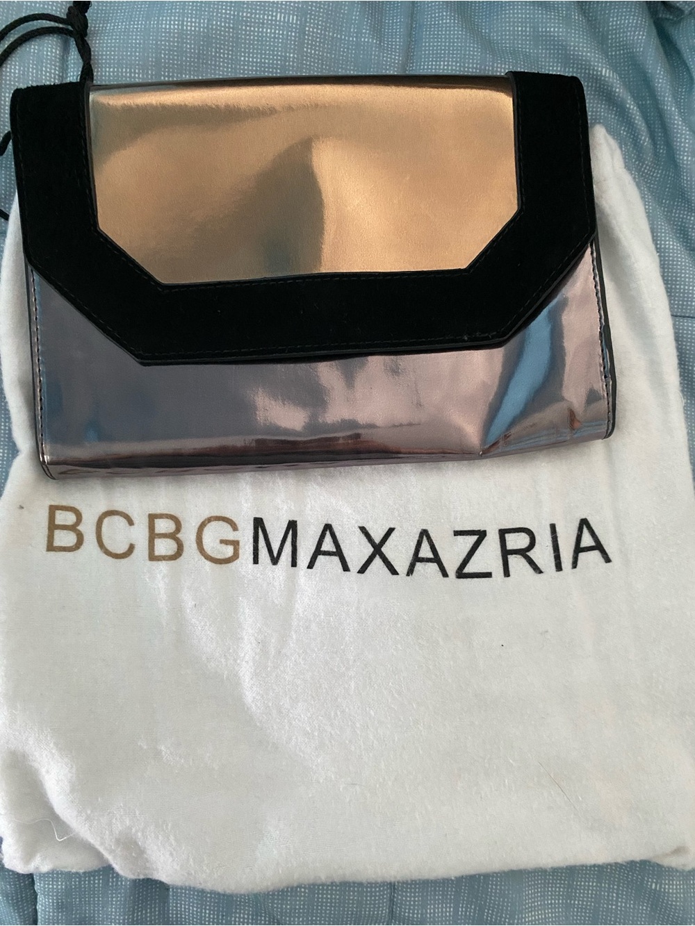 BCBGMaxAzria Metallic Rose Gold and Black Accent Clutch
